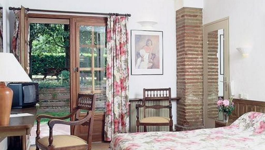 Le Ratelier Hotel Montaigut-sur-Save Szoba fotó